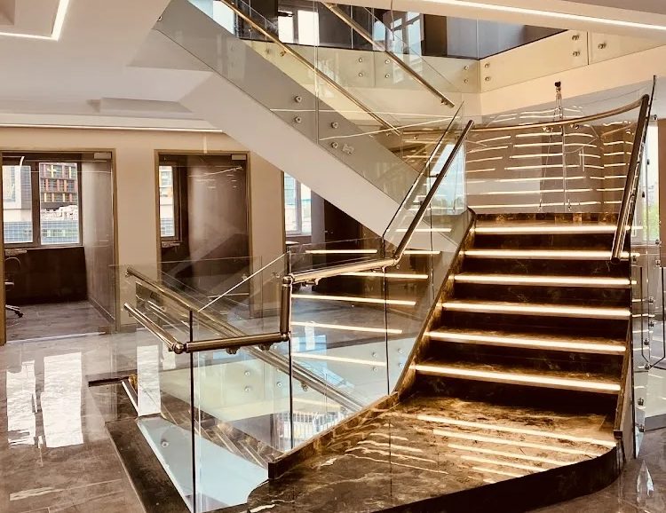 Staircase with illuminated steps at our hair transplant clinic in Istanbul